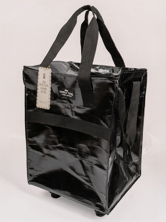 Metallic Zippered Roll Tote Bag: Shiny black tote with sturdy handles, four wheels, front pocket, zip closure, and "Simply Tote" tag. Available in sizes: 19" x 14" x 9".