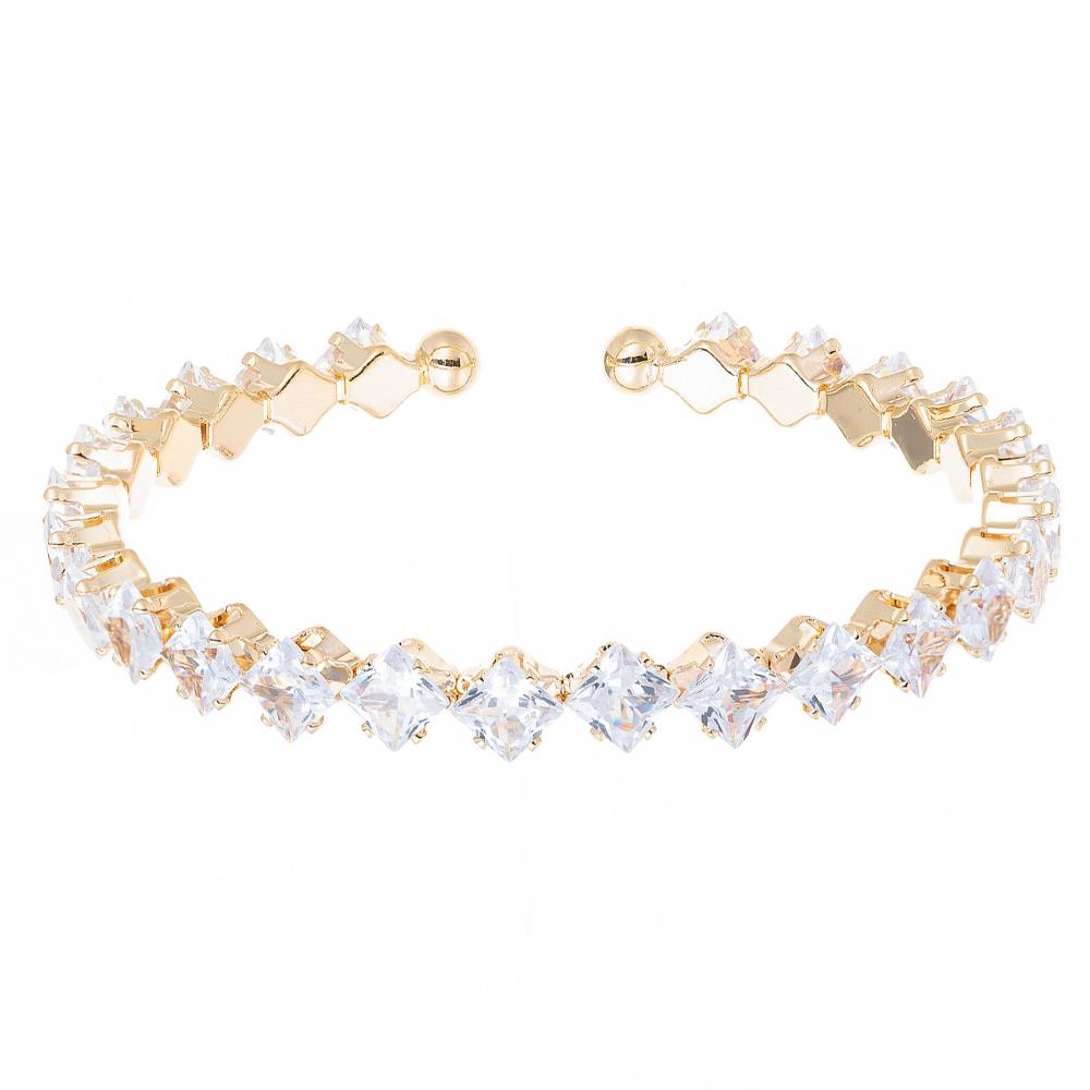 Gold cuff bracelet with square clear crystals and small gold spheres at open ends. Available in S, M, L sizes.