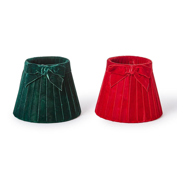 Dark green and red pleated velvet bow lampshades with ribbon accents.