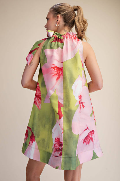 Royal Mini Dress Ruffle Neck Tie: sleeveless, bold floral print, high gathered neckline, loose fit. Sizes: XS-XL.