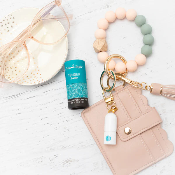 Blue "Tender" Keychain Mini Rollerball Perfume shown. Available in 5ml and 10ml sizes.