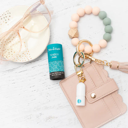 Blue "Tender" Keychain Mini Rollerball Perfume shown. Available in 5ml and 10ml sizes.