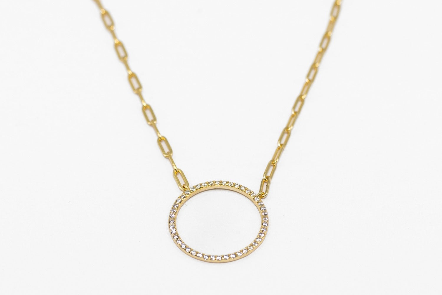 August 18k Gold Necklace with a diamond-outlined circular pendant. Available in 16", 18", and 20" lengths.
