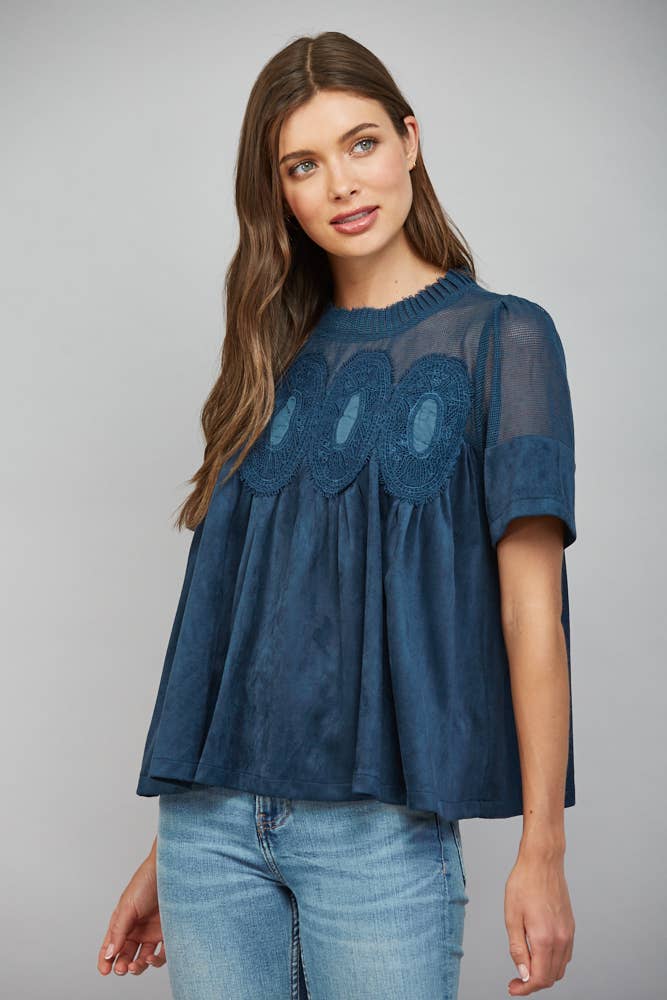 Teal blue faux suede top, size M, featuring a sheer mesh upper panel and lace applique on the chest.