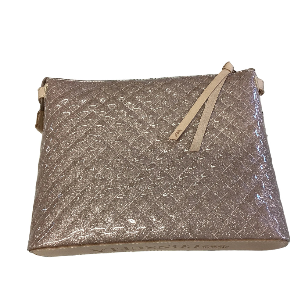 Shimmering rosegold quilted Downtown Crossbody, Ori, with adjustable strap and zipper pull. Available in various sizes.