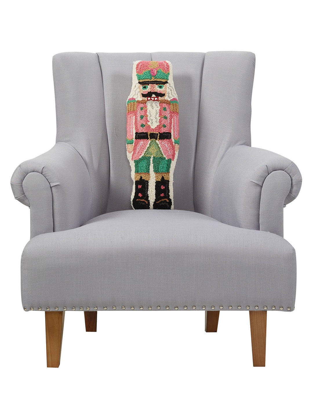 Shaped Pink Nutcracker Hook Pillow, available in 12″x20″, adds festive nutcracker-inspired detail.