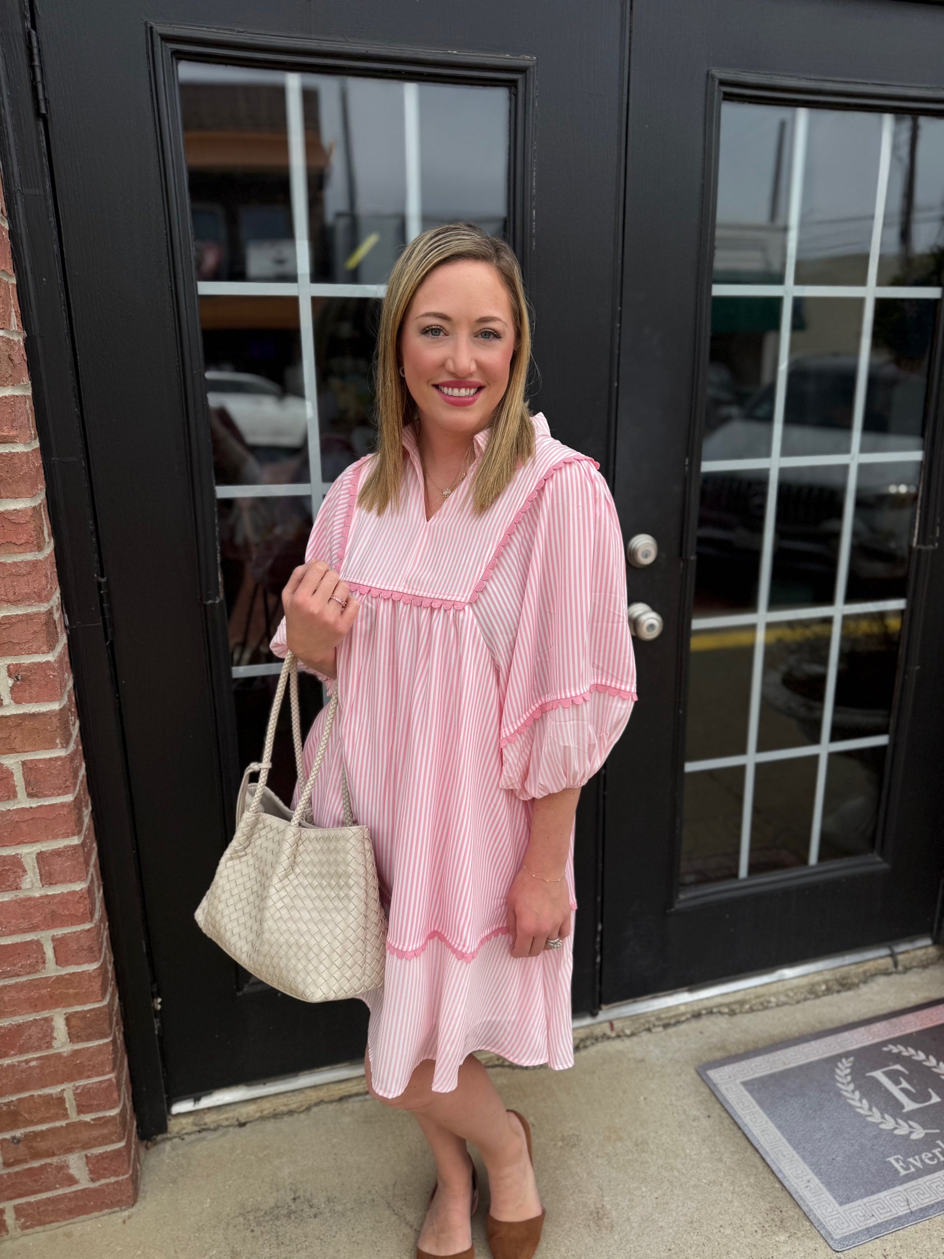 Pink Coastal Patch Dress with playful pattern detailing. Available in sizes XS-XL.