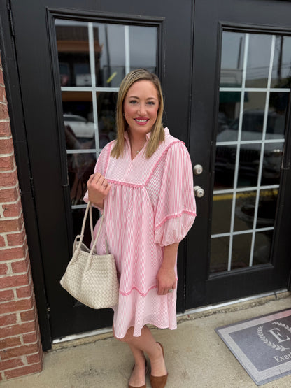 Pink Coastal Patch Dress with playful pattern detailing. Available in sizes XS-XL.