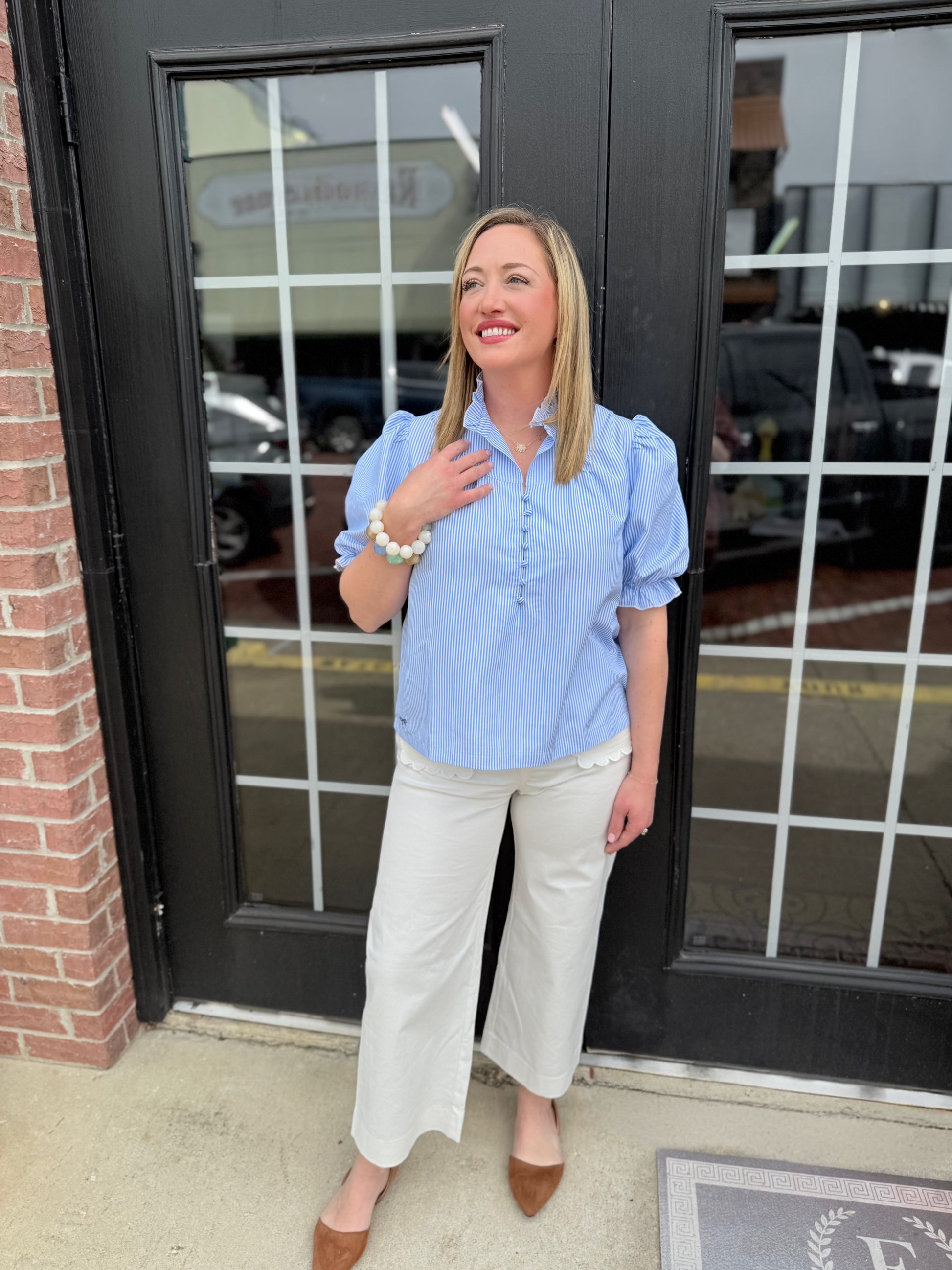 Seersucker Blue Striped Top with relaxed fit; available in sizes XS–XL.