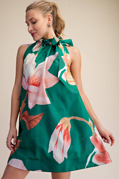 Mini Dress Ruffle Neck Tie Sleeveless Floral Print in Royal, features ruffled neck tie and vibrant floral design. Sizes: S.