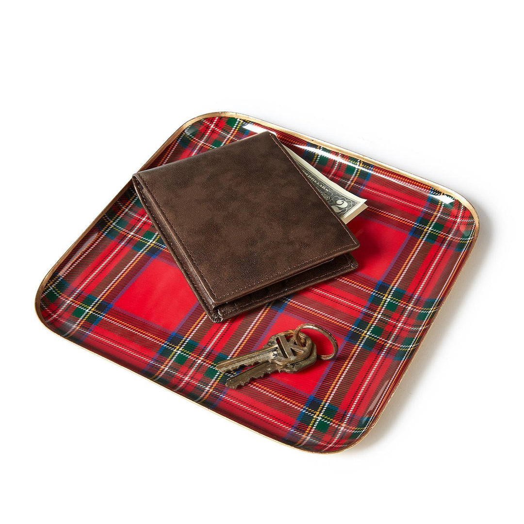 Square red tartan metal trays with gold-toned edges.