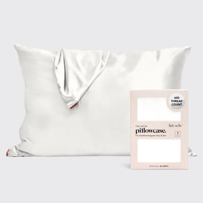 Ivory satin pillowcase, 600 thread count, promotes frizz-free hair and smoother skin. Available sizes: Standard, Queen, King.