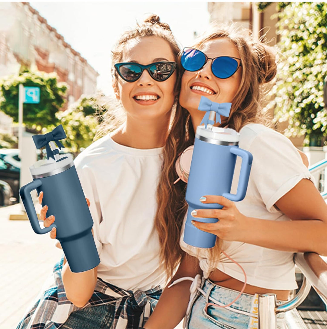 Tumblers with Large Bow Straw Covers, available in multiple sizes, shown in use.