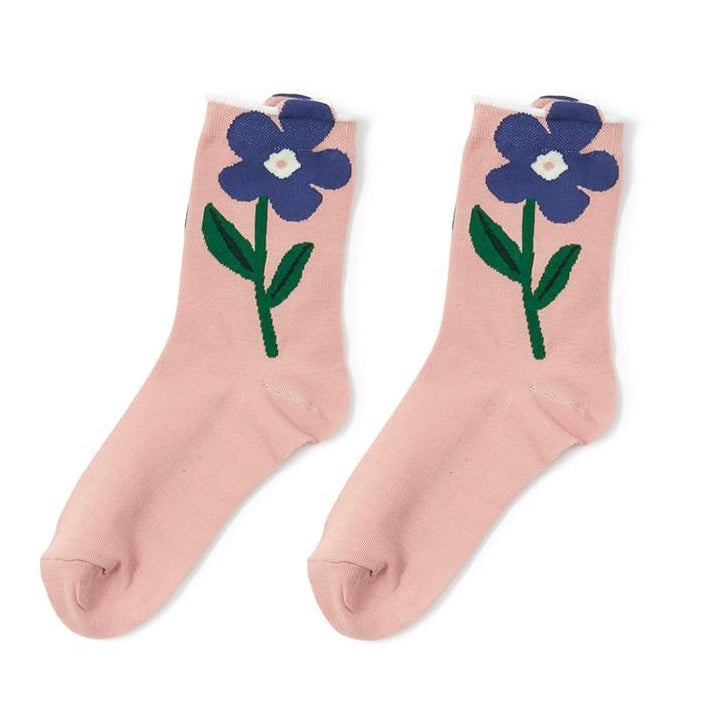 Pink cotton socks with a purple flower, white center, green stem and leaves. Available in sizes S, M, L.