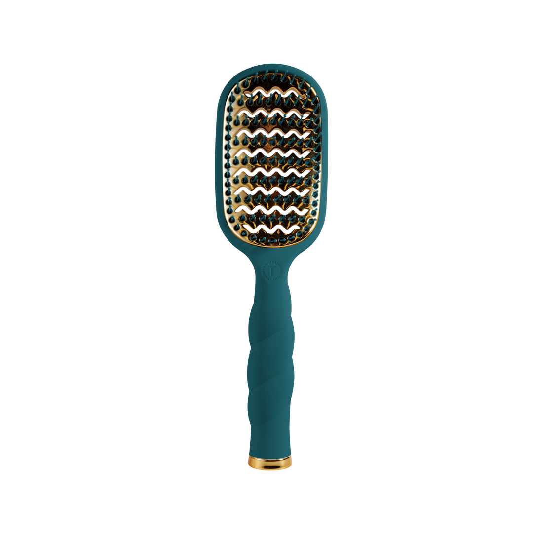 The Vented Hair Brush - Teal With It has anti-static bristles on a wavy gold pad and a textured teal handle for faster blowouts. Available in standard size.