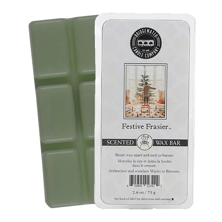 Sage green Festive Frasier Wax Bar in plastic packaging with a Christmas tree label.
