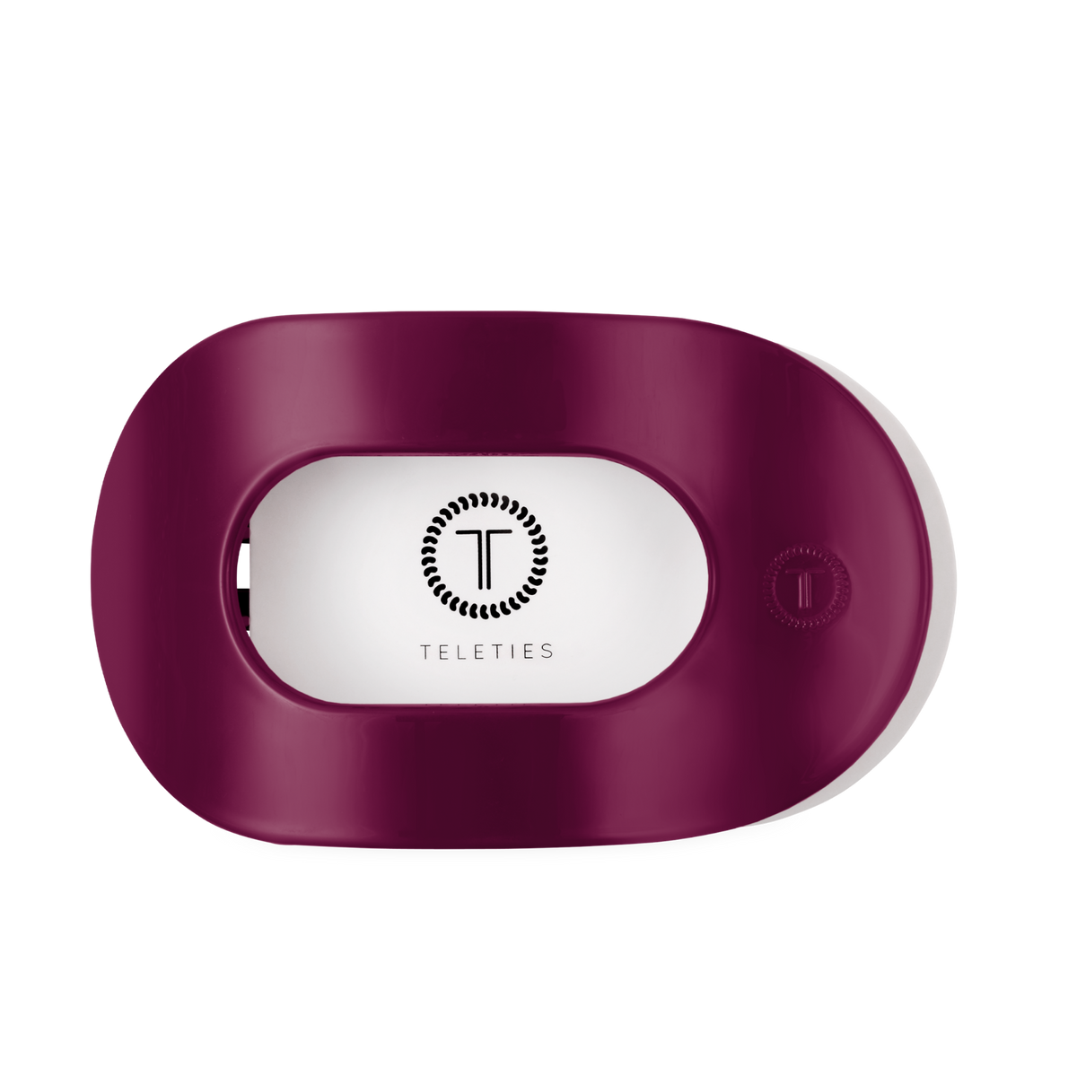 Mulberry Large Flat Round Hair Clip in oval maroon with central circular cutout, ridged pattern, and “T” TELETIES logo. Available in large size.