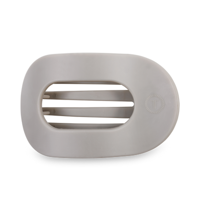 White oval soap dish with three drainage slats and a small circular logo on the right. Sizes available: small, large.