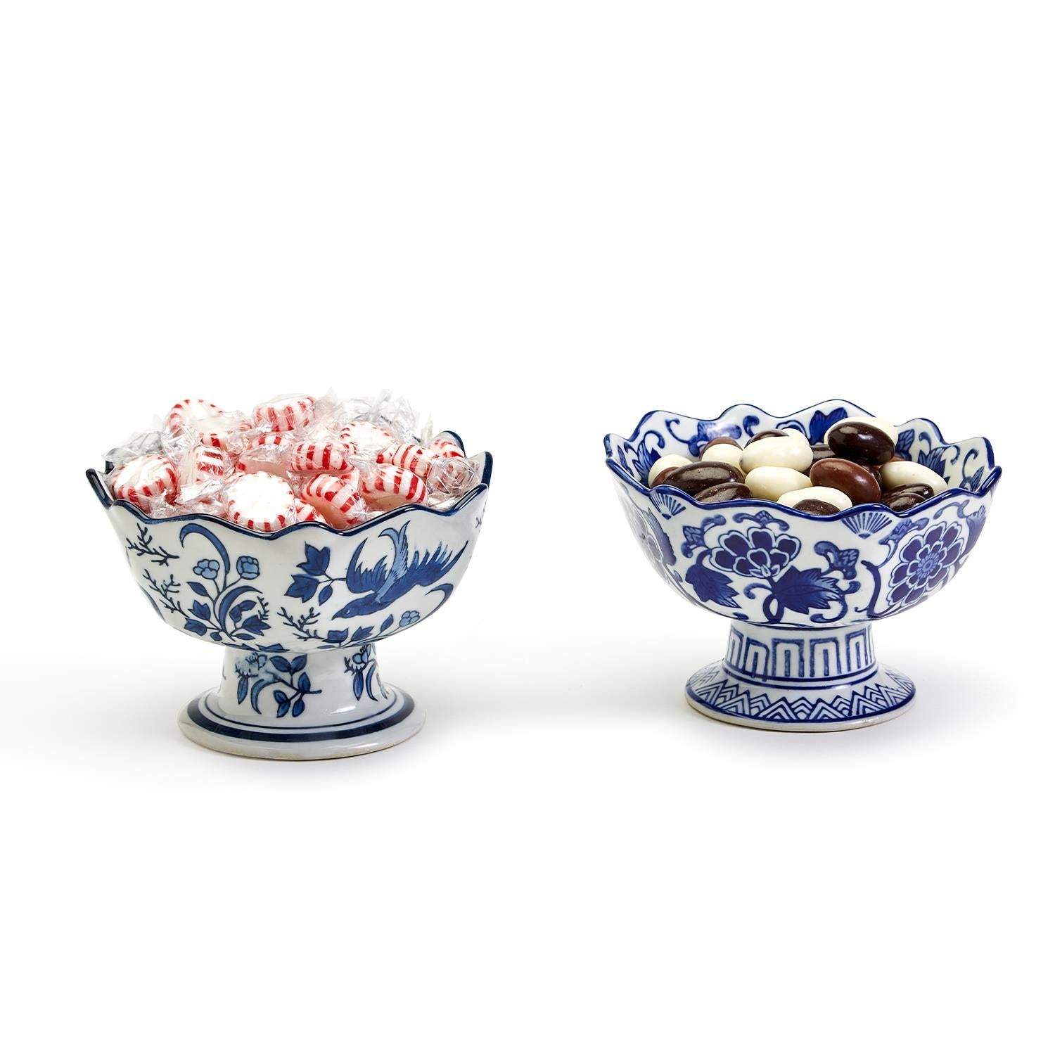 Two blue and white porcelain scalloped edge footed bowls, possibly hand painted. Available in small and large sizes.