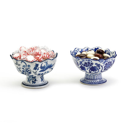 Two blue and white porcelain scalloped edge footed bowls, possibly hand painted. Available in small and large sizes.