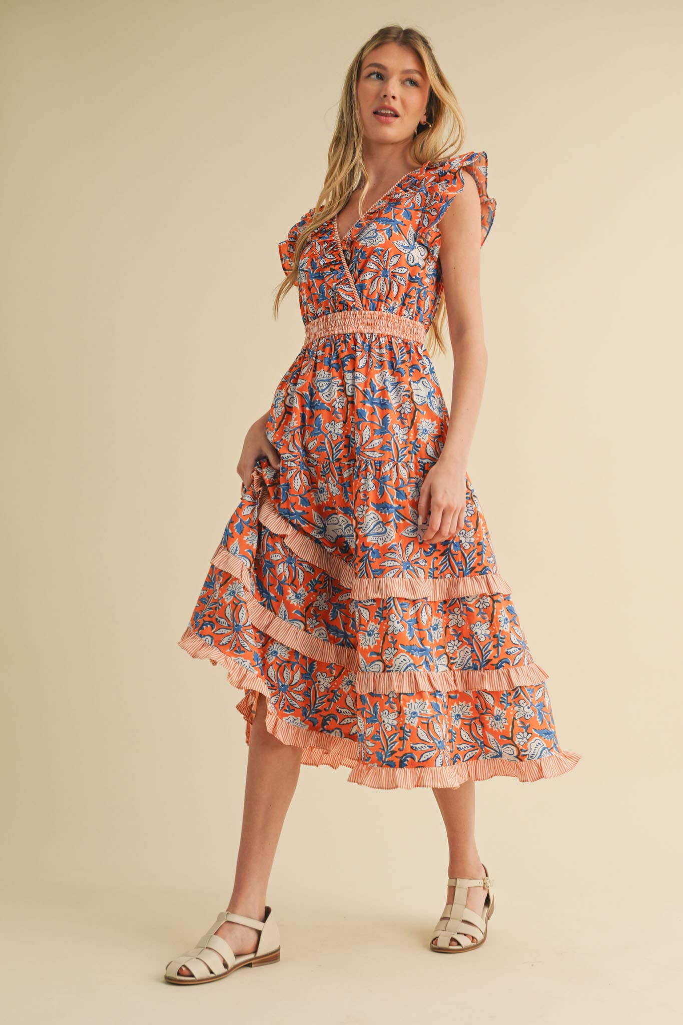 Mixed Floral Print Ruffle Trim Midi Dress with smocked elastic waistband. Available in sizes XS to XL.