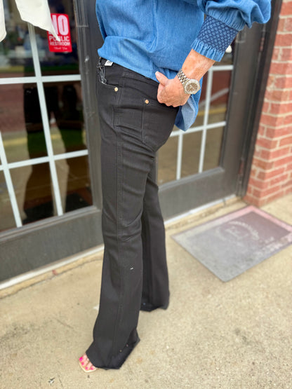 Judy Blue HW Tummy Control Cut Hem Black Flare Jeans, available in sizes 0-24. Black denim, tummy control panel, cut hem flare style.