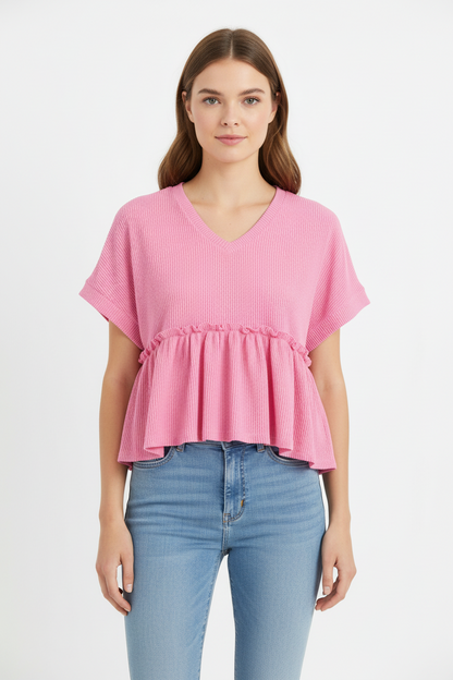 Corded Pink Tiered Top with V-neckline and high-low waistline. Available in sizes XS-XL.