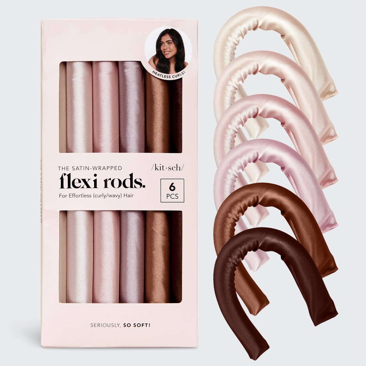 Six vegan satin hair rollers in brown, pink, and cream, shown in and beside the box. Available in standard flexi rod size.
