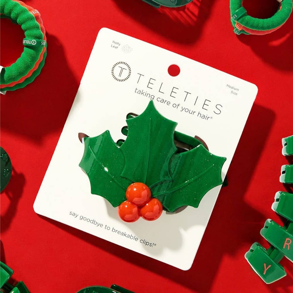 Glitter Holly Leaves Flat Hair Clip with green glitter leaves and three red berries, size Medium.