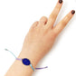 Adjustable Mood Bracelet with a large, round blue gemstone that shifts colors between blue and purple. Available sizes: One size fits all.