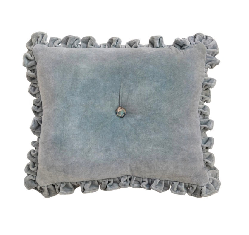Velvet Ruffle Lumbar Pillow: square, light blue velvet with ruffled edges and central button tuft. Available in 12″x20″, 14″x24″.