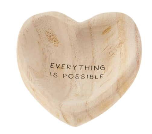 Heart-shaped wooden bowl engraved with "EVERYTHING IS POSSIBLE" inside; available in small and large sizes.