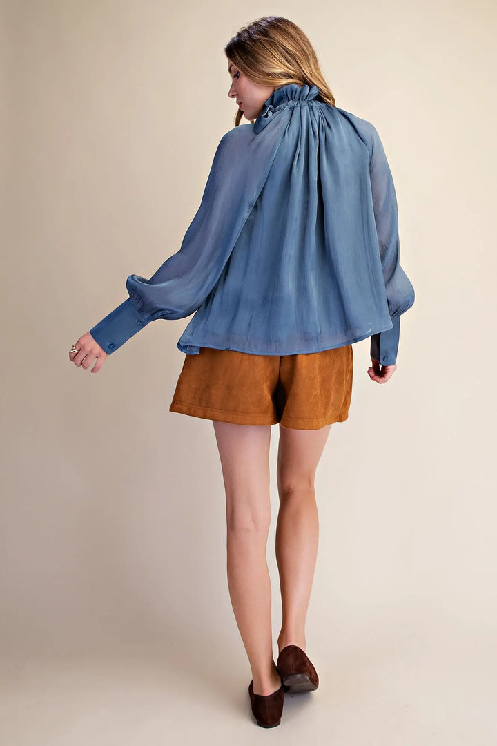 Ruffle Neck Adjustable Tie Long Sleeve Blouse in sheer blue chiffon, available in sizes XS-XL.