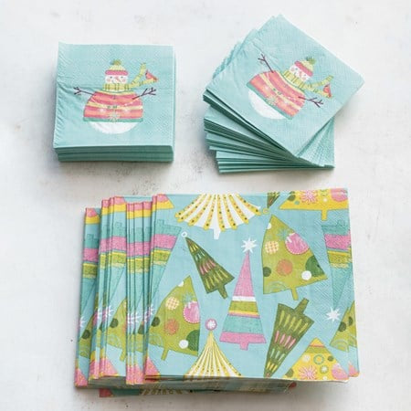 Snowman 4” square paper cocktail napkins and Christmas tree pattern paper napkins.