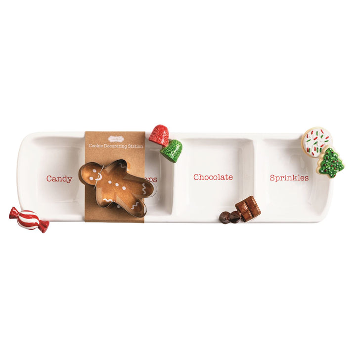 Three-section white ceramic serving plate labeled “Candy,” “Chocolate,” and “Sprinkles.”.