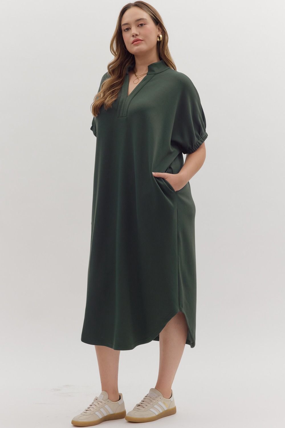 Dark green Collie Midi Dress with V-neck, band collar, short sleeves, and side pockets. Available in multiple sizes.