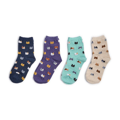 Set of four ankle socks in navy, purple, mint, and beige with colorful cat face patterns; available in sizes S, M, and L.