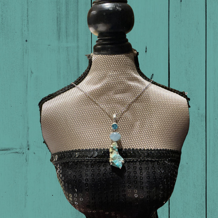 Vintage Sterling Silver Pendant Necklace with turquoise pendant and two round beads. Available in 16", 18", and 20" lengths.