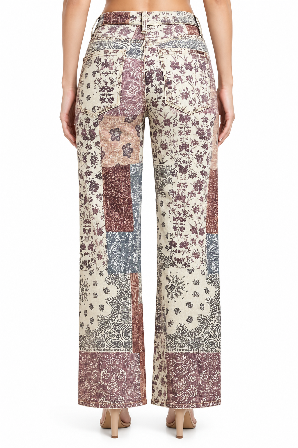 Risen High Rise Ankle Wide Jeans in a high-rise, wide-leg fit with a patchwork floral and paisley print. Available in multiple sizes.