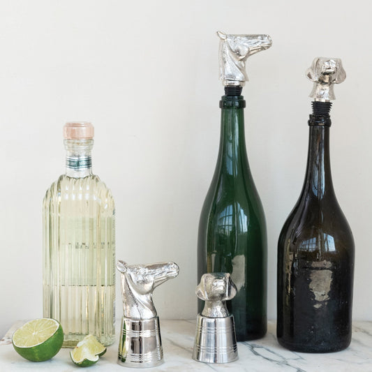 Cast Iron Stainless Steel Jigger pourers in horse and dog head shapes. Available in multiple sizes.