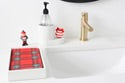 BPA-free melamine guest towel holder; available in small, medium, and large sizes; white finish.