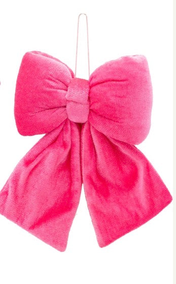 Large, bright pink velvet bows with hanging loop.