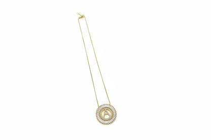 Crystal Initial Necklace: delicate chain, gold double-ring pendant with sparkling stones. Available in 16", 18", and 20" sizes.