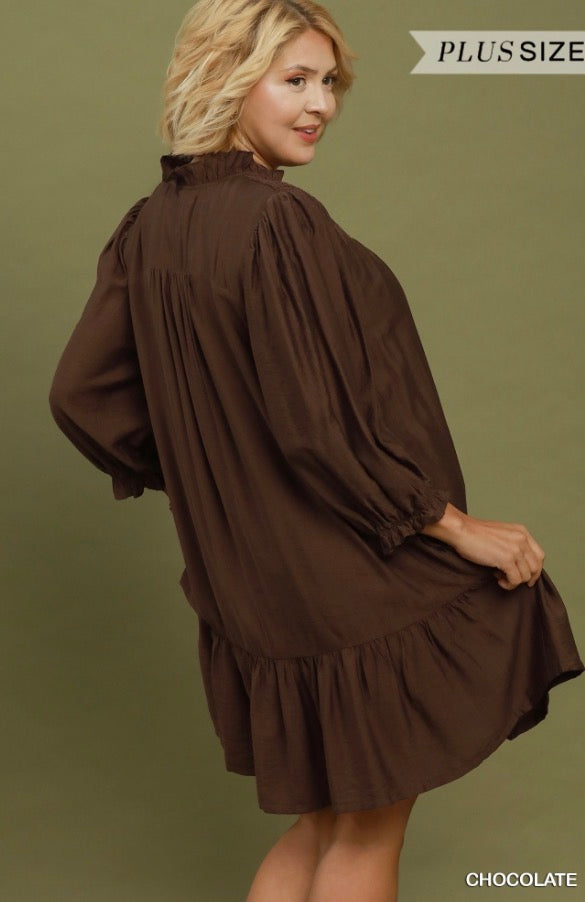 Smocked Ruffle Tiered Mini Dress in chocolate; flowy, long-sleeved, ruffled. Available in plus sizes.