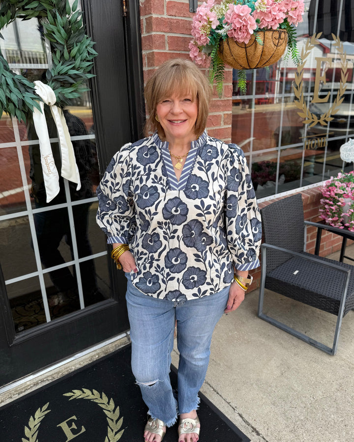 Bonnie Ruffle Floral Blouse with ruffled details, available in sizes XS-XL.