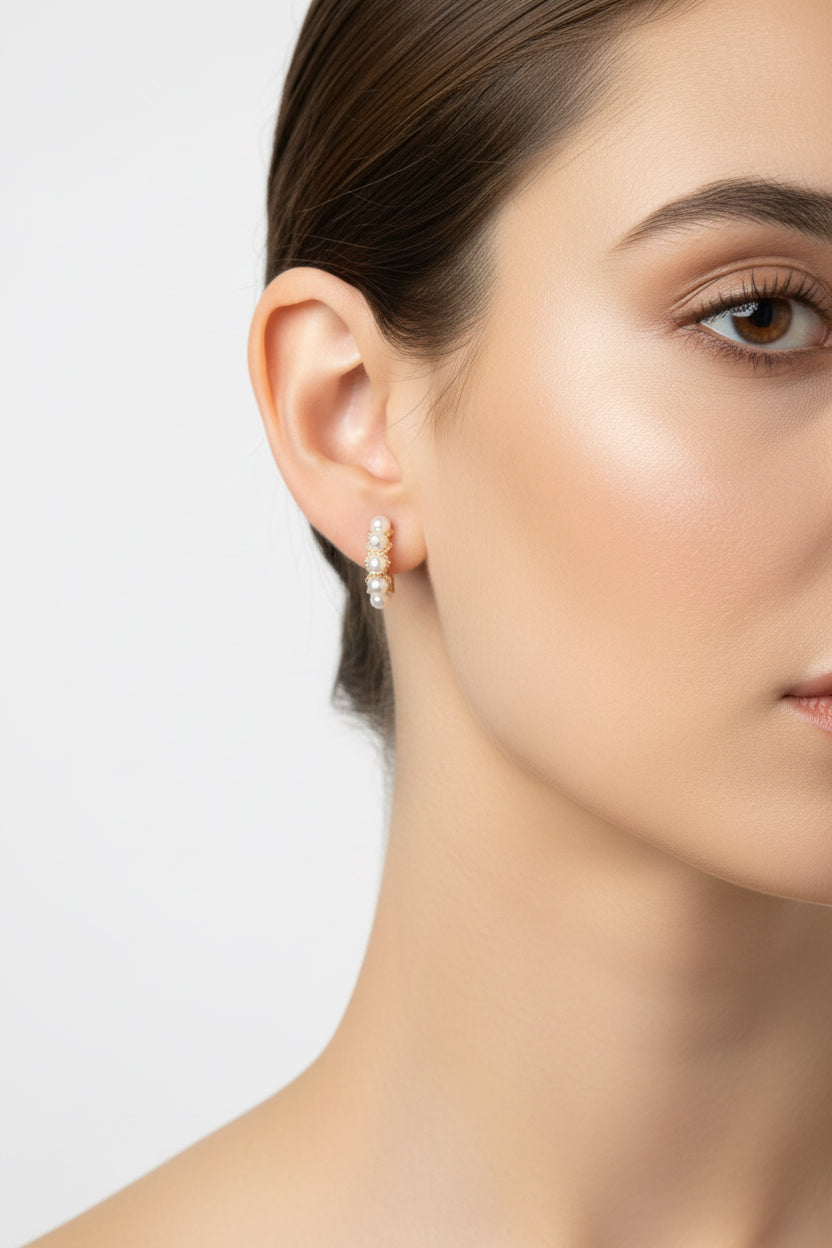 Hoop earrings with a row of small pearls. Available in 20mm and 30mm sizes.
