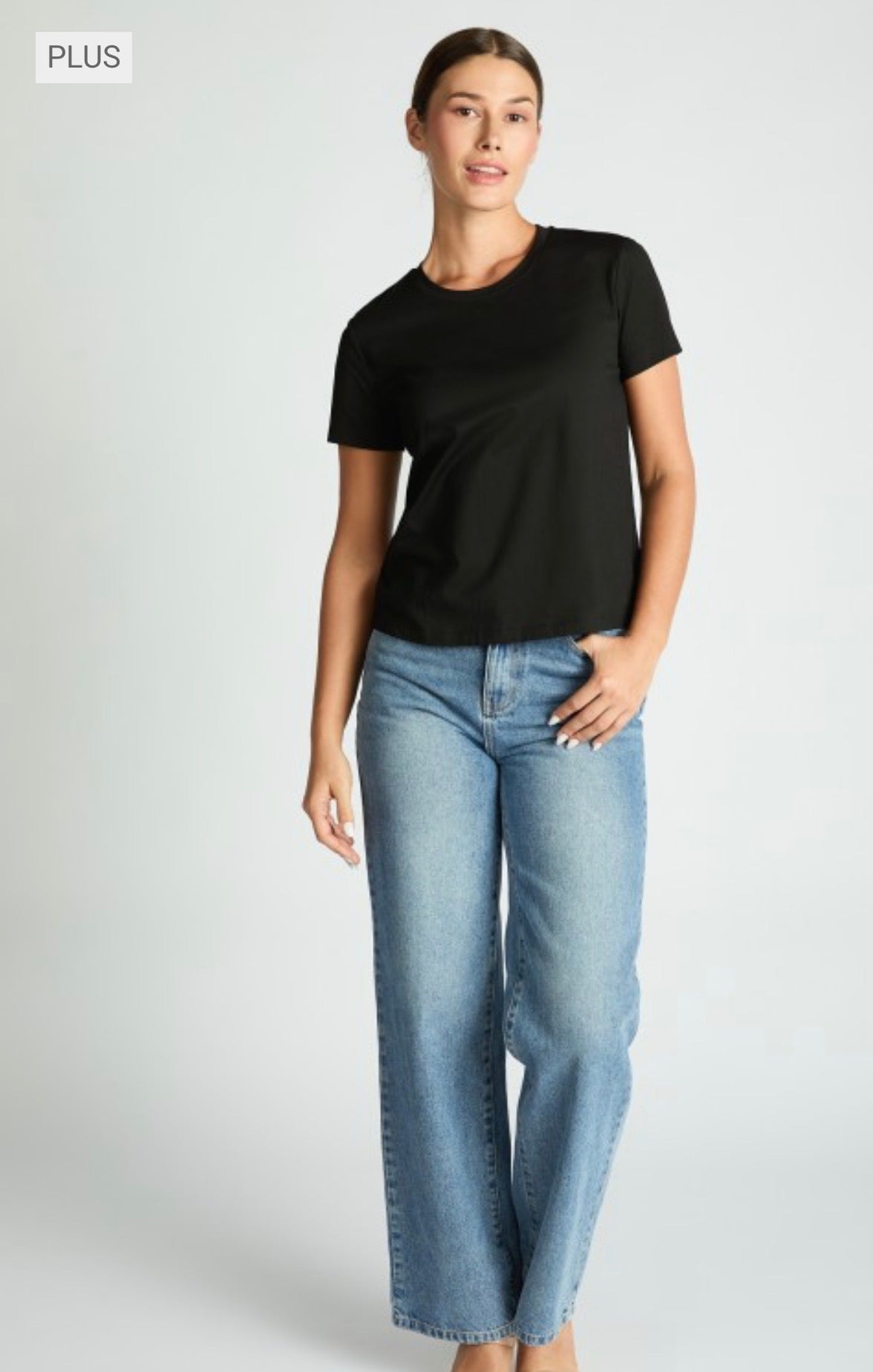 Cotton Short Sleeve Top in black; available in sizes XS–XL. Simple design, short sleeves, soft cotton fabric.