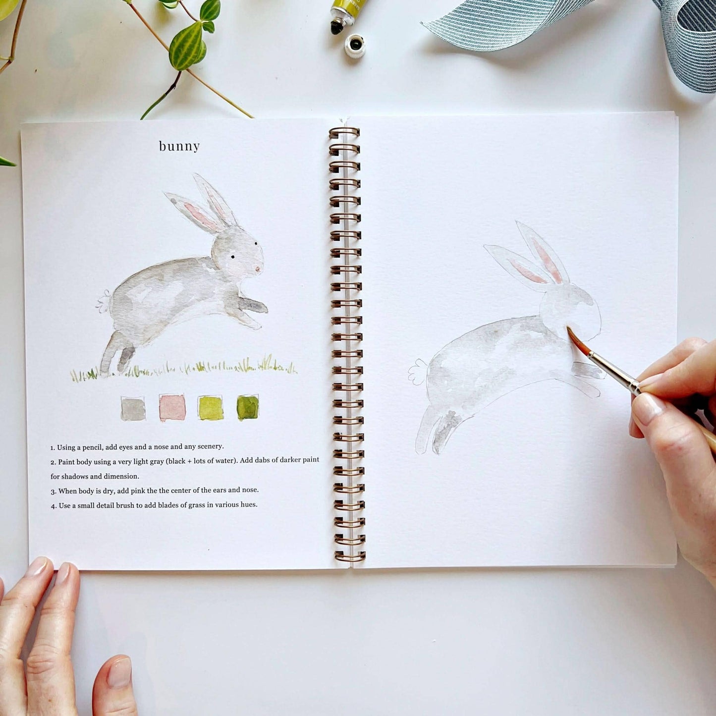 The Animals Watercolor Workbook shows easy bunny painting steps and finished art. Available in multiple sizes.