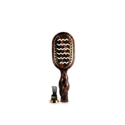 Mini Vented Brush in tortoise color with a wavy handle; available in mini size.