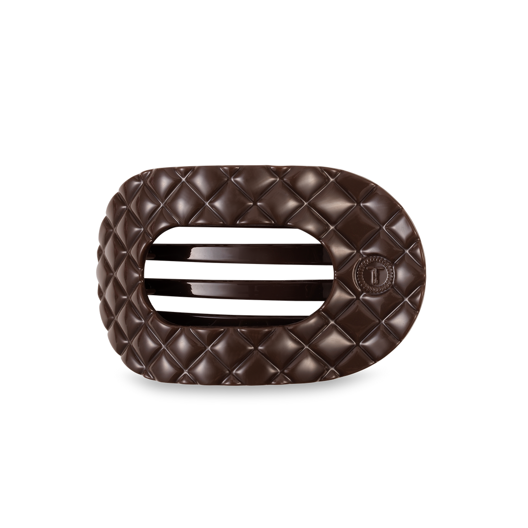Dark chocolate piece, oval cushion shape with quilted pattern and center slits. Available in small, medium, and large sizes.